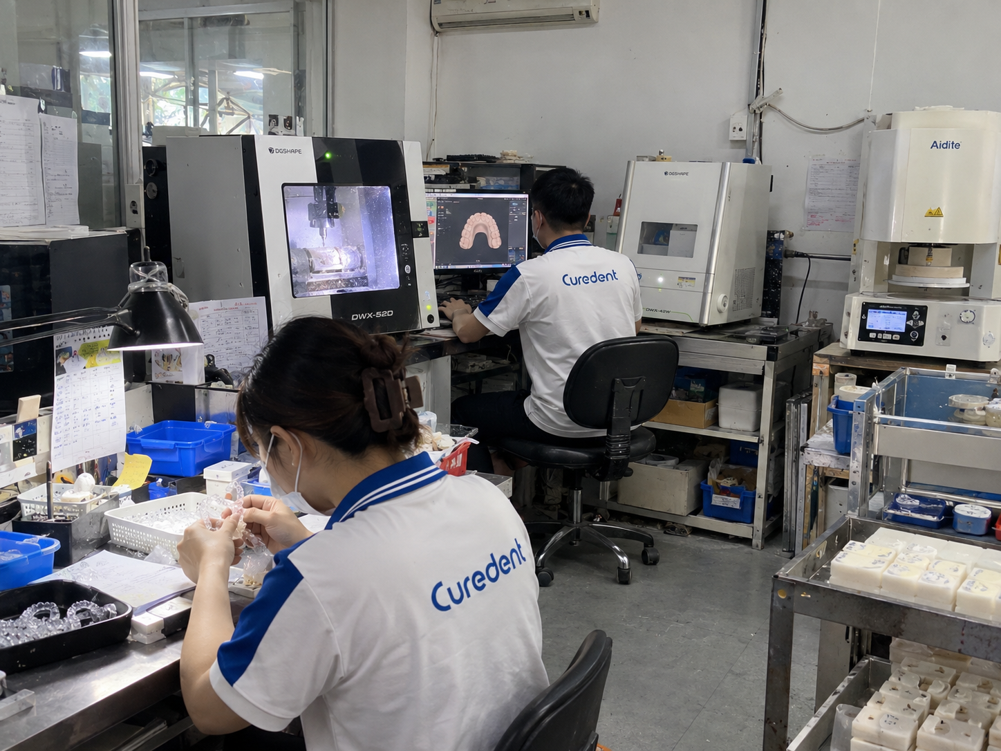 Curedent digital dental manufacturing team and workflow